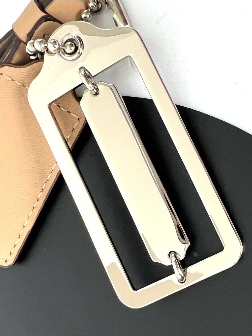 COACH Beige Leather Silver Logo 3 Piece Bag Charm Keychain Hang Tag Set